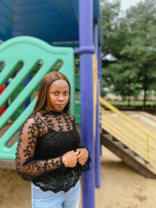 Iruoma at the playground in the ndubuisi kanu park