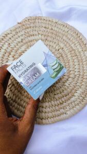 Face facts hydrating day cream white package on a rattan mat