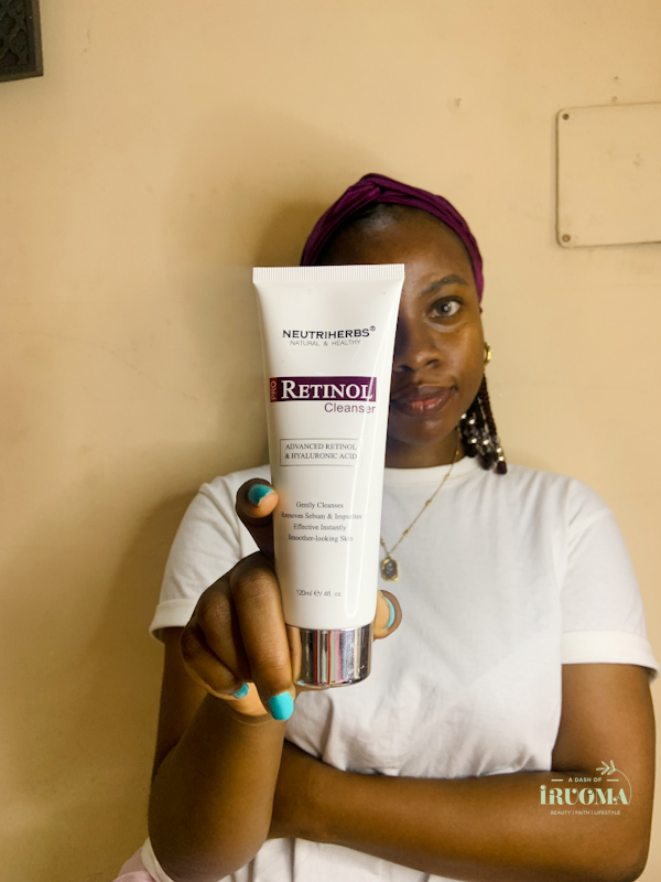 iruoma-holding-a-retinol-cleanser