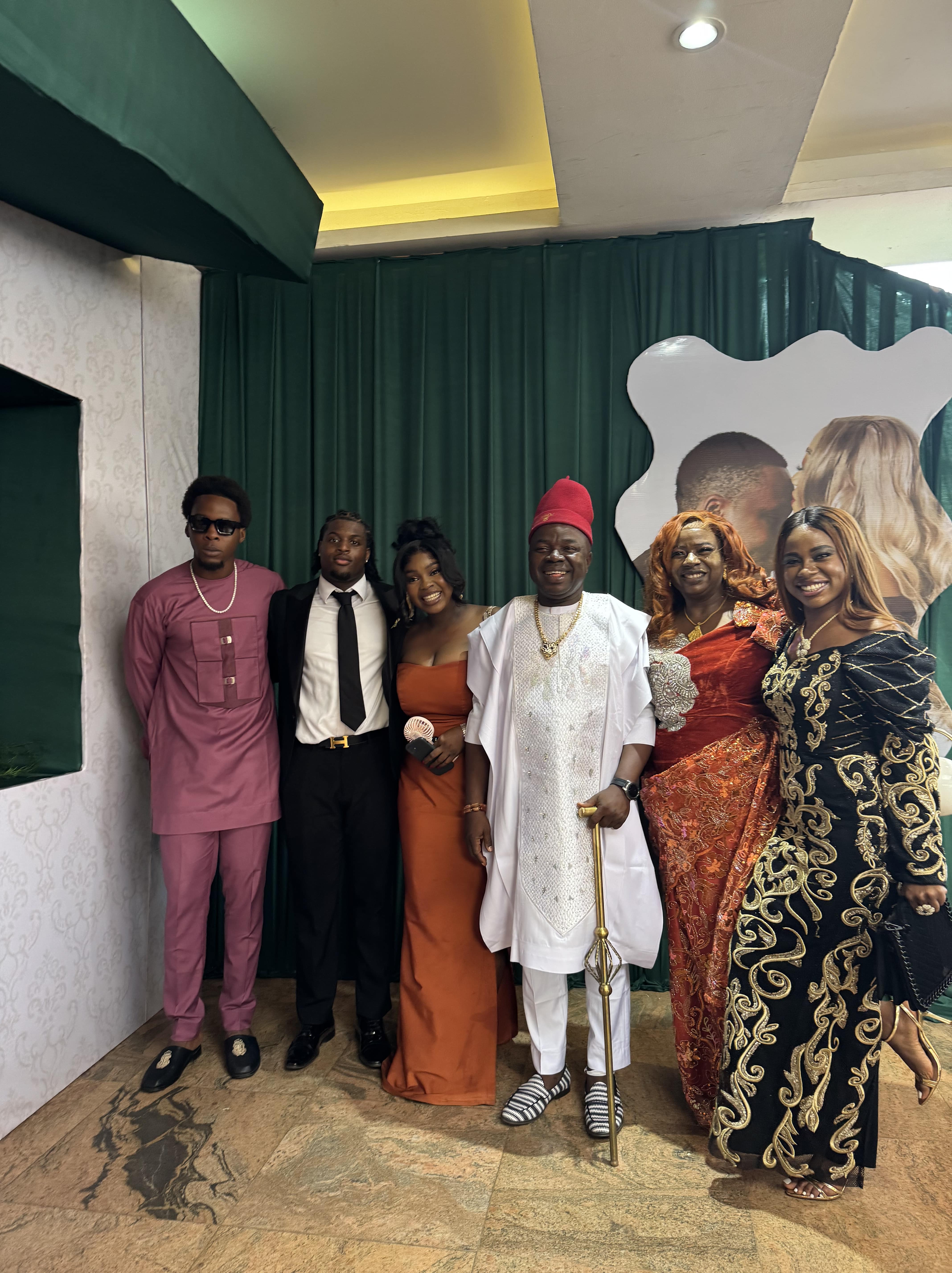 Iruoma-and-family-at-a-wedding
